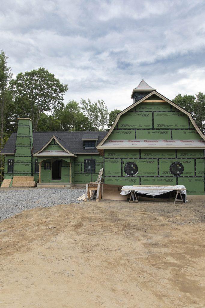An exterior shot of a home under construction